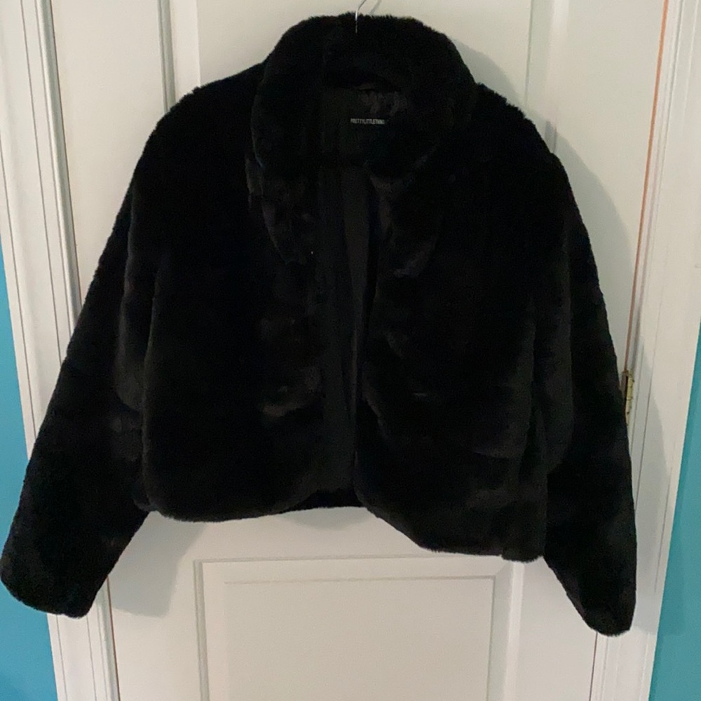 Women’s black fur coat